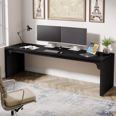 an office desk with two computer monitors and a chair