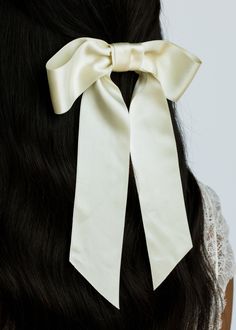 The Virginia Bow Barrette is a classic silhouette, featuring a wide, oversize bow crafted from double faced silk satin. An automatic bow barrette makes styling effortless. The natural movement of the length of the bow captures beautifully in photos, creating moments you'll want to capture and remember. Try pairing the bows with coordinating earrings. Daffodil Color, Bow Hairstyles, Satin Hair Bow, Luxury Hair Accessories, Bow Barrette, Bow Hairstyle, Natural Movement, Jennifer Behr, Hair Ribbons