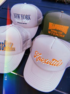 Show off your love for your favorite national park in our Yellowstone trucker hat.- Features the phrase "Yellowstone National Park" across the front all in an orange ink- Individually heat pressed onto each hat- 5 Panel, Mesh Back with Snap Back*due to screens & filters colors may vary slightly to photos* Yellow Trucker Hat For Outdoor, Yellow Snapback Trucker Hat With Letter Print, Outdoor Trucker Hat With Letter Print, Yellow Letter Print Snapback Trucker Hat, Trucker Hat With Letter Print For Outdoor Activities, Letter Print Trucker Hat Snapback For Outdoor Activities, Outdoor Trucker Hat With Letter Print And Curved Brim, Letter Print Trucker Hat With Curved Brim For Outdoor, Letter Print Snapback Trucker Hat For Outdoor Activities