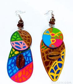 Note: Please Read My shop shipping policies before ordering❤️🖤💚 These beautiful earrings was created by sacred divine hands..  Enjoy the Beautiful Energy,  They were most definitely, made for a Queen 🦋 ✨HOT SELLERS ✨ They are hand painted (using a small metal stick) with acrylic (nontoxic) paints on lightweight wood Glossed with a clear gloss for protection. Size: 4.5in Earrings Approximately Sterling Silver earhook wires  Please don't not let the earrings (wood part) get wet. Remove when taking bath showers , washing hands, dishes, applying lotions or body creams or body oils, etc  Note: items that are handmade/hand painted,  will varies in size, shape or designs.  Clip ons can be added (send a note with order, to adjust) Beads may vary. Thanks for supporting Handmade  You are apprecia Artisan Earrings With Artistic Design For Gift, Artisan Earrings With Artistic Design As A Gift, Multicolor Bohemian Dangle Plug Earrings, Bohemian Multicolor Dangle Plug Earrings, Unique Teardrop Plug Earrings For Gift, Colorful Artsy Dangle Earrings, Artisan Teardrop Earrings With Artistic Design, Artisan Multicolor Earrings For Gift, Unique Artistic Drop Earrings