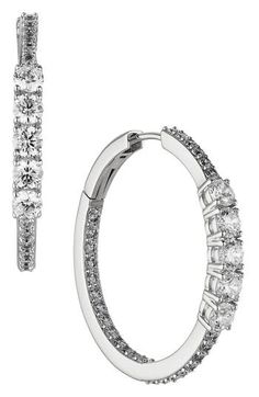 Small pavé cubic zirconia graduate to larger sparkling stones on these contemporary hoop earrings that add a glamorous effect to any look. 1" hoop diameter; 1/4" width Snap-post closure 18k-gold plate or rhodium plate/cubic zirconia Imported Bath And Body Works Perfume, Small Hoop Earrings, Diamond Hoop Earrings, Hoop Earrings Small, Body Works, Rhodium Plated, Diamond Bracelet, Cubic Zirconia, Inside Out