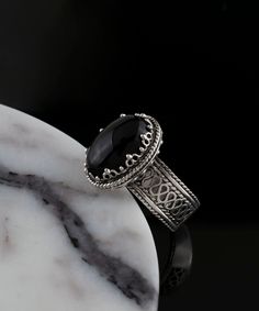 Black Onyx Silver Gothic Oval Statement Ring, 925 Sterling Artisan Made Jewelry Handcrafted Filigree Goth Cocktail Ring, Handmade Jewelry, black stone ring, silver boho dainty ring, gothic jewelry, silver boho ring Material: 925 Sterling Silver ( NICKEL FREE ) Gemstone: Amethyst 10x14 mm. FREE, FAST AND TRACKABLE SHIPPING FOR ALL EU COUNTRIES AND USA. -That ring is so stunning and dainty. Perfect for everyday wear. There is a gorgeous small Flower on the band of the ring and Amethyst Gemstone that dainty. This purple stone ring is made from our finest silver so they are durable for your everyday wear. COMES WİTH VELVET POUCH AND LUXURY GİFT BOX. Makes a great gift: Beautiful jewelry to give for every occasion. The perfect present  for mom , sister, daughter , granddaughter , grandmother , Victorian Black Sterling Silver Rings, Victorian Style Black Sterling Silver Rings, Black Oval Ring With Intricate Design, Black Oval Rings With Intricate Design, Ornate Black Sterling Silver Rings, Ornate Black Oval Ring, Black Sterling Silver Filigree Ring As A Gift, Black Filigree Ring With Intricate Design, Ornate Black Rings As Gift