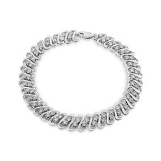 Shimmer and shine with this pleasing diamond link bracelet. Crafted from cool weaves of sterling silver, this mesmerizing choice features sculpted "S"-shaped links. Beaded details and diamonds - each artfully set to enhance size and sparkle - glisten in pairs between each link. Splendid with 1/2 ct. t.w. of diamonds and a bright polished shine, this 7.25-inch bracelet secures with a lobster claw clasp. Eco Brand, Shimmer And Shine, Shimmer N Shine, Fine Jewelry Bracelets, Elegant Earrings, Beauty Brand, Link Bracelets, Timeless Beauty, Diamond Bracelet