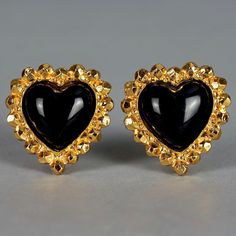 Features: - 100% Authentic EDOUARD RAMBAUD. - Black resin heart earrings. - Gold tone hardware. - Clip back earrings. - Signed EDOUARD RAMBAUD PARIS. - Excellent vintage condition. Measurements: Height: 1.57 inches (4 cm) Width: 1.49 inches (3.8 cm) Weight per Earring: 16 grams **These earrings will be shipped via DHL Shipping with tracking number. Please convo me for any queries and additional photos. Thank you for visiting. Other Fees that buyers need to know: Please make sure you know and und Formal Heart-shaped Clip-on Earrings, Heart-shaped Clip-on Earrings For Formal Occasions, Heart Shaped Clip-on Earrings For Formal Occasions, Valentine's Day Heart Clip-on Earrings, Black Earrings For Valentine's Day Anniversary, Black Earrings For Anniversary On Valentine's Day, Elegant Black Heart Earrings For Anniversary, Black Heart Earrings, Black Resin