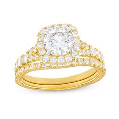 Embrace the bliss in every moment of your love story with this round lab-created diamond cushion-frame bridal set in 14K gold. Crafted in 14K gold The engagement ring showcases a 1 ct. certified round lab-created diamond boasting a color rank of I and clarity of Si2. Lab-created diamonds line the cushion-shaped frame and the subtly split shank. Completing the look, the contoured wedding band shimmers with lab-created diamonds. Includes certification card This bridal set shines with 1-7/8 cts. t. Dazzling Halo Setting Wedding Ring, Anniversary Bridal Sets With Halo Setting In Moissanite, Dazzling Wedding Ring With Halo Setting, Formal Moissanite Bridal Sets With Halo Setting, Wedding Lab Grown Diamond Cut Ring, Wedding Diamond Ring With Cushion Cut, Cushion Cut Diamond Ring With Prong Setting For Wedding, Formal Cubic Zirconia Halo Bridal Set, Cushion Cut Lab Grown Diamond For Wedding