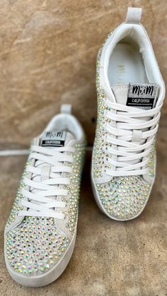 Our Silver Rhinestone Sparkle Sneakers take casual to the next level with the neutral beige colored suede and multi-color all over rhinestone detail. The combination of these features ensures an eye-catching look, while the soft beige suede and comfort sole provides all day comfort. Sparkle Sneakers, Soft Beige, Neutral Beige, Silver Rhinestone, Next Level, Athletic Shoes, The Next, Multi Color, Sparkle