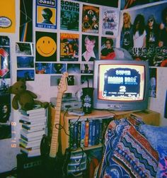 a room filled with lots of pictures and a tv