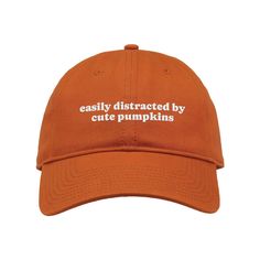 Embrace your love for all things pumpkin with this trendy embroidered dad hat. Crafted for comfort and style, this hat features a playful, simple design perfect for autumn enthusiasts. The adjustable strap ensures a perfect fit, making it an ideal accessory for any fall outfit. ♥ 100% garment-washed cotton twill. ♥ Unstructured, six-panel, low-profile. ♥ Pre-curved visor. ♥ Tri-glide buckle closure. ♥ Embroidered in the USA. *GB210 *Shipping Info* -Most orders will ship within 3 business days. S Vintage Baseball Hats, College Girl Gifts, College Girls, Cute Pumpkin, Halloween Funny, Pumpkin Patch, Halloween Pumpkins, Dad Hats, Girl Gifts