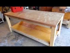 a wooden table sitting on top of a hard wood floor