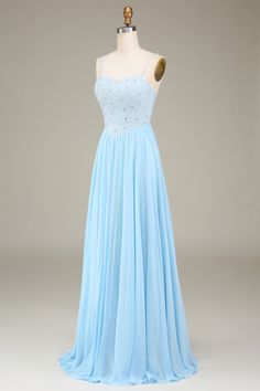 a light blue dress on a mannequin with beading and sequins