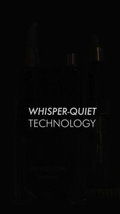 the words whisper quiet technology are lit up against a black background with white writing on it