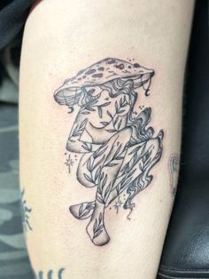 a woman's leg with a pizza tattoo on it