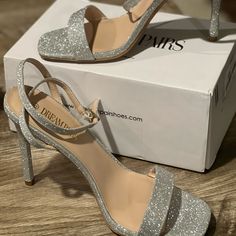 Beautiful New Silver Straps High Heel. Never Been Worn In The Box. 4 Inch Heel. Heels Glitter Silver, Silver Heels With Straps, Glittery Silver Heels, Hocoming Shoes, Black And Silver Heels Prom, Silver Dance Shoes, High Heels Silver Shoes, Silver Hoco Shoes, Prom Silver Heels