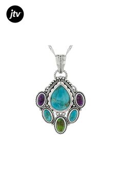 Introducing the stunning Multi-Color Composite Turquoise Sterling Silver Pendant With Chain by Southwest Style by JTV���. This exquisite piece features a mesmerizing combination of composite turquoise in shades of blue, green, and purple elegantly bound together to create a one-of-a-kind design. The pendant showcases pear-shaped and oval turquoise gemstones with varying lengths and widths for an eye-catching appeal.  Crafted from high-quality sterling silver, this pendant measures 1.62 inches in Blue Multi-stone Bohemian Turquoise Necklace, Bohemian Blue Multi-stone Turquoise Necklace, Elegant Multicolor Turquoise Necklace For Gift, Elegant Turquoise Multi-stone Necklaces, Elegant Turquoise Multi-stone Necklace, Elegant Multi-stone Turquoise Necklace, Elegant Green Teardrop Turquoise Necklace, Pendant With Chain, Southwest Style