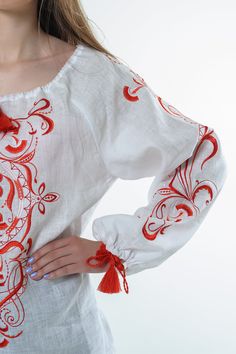 "Embroidered blouse \"Travy\", 100% linen, white colour. Machine satin stitched silk embroidery in purple, blue or red colours. Long sleeves, embroidered pattern throughout the length. Floral motifs in ornaments appeared as a demonstration of respect for nature, nature-worship, connection with it. In general plants mean eternal youth and beauty. At the heart of this embroidery is the Tree of Life that symbolizes prosperity, might, infinity of life and strength of connection between generations. Traditional White Linen Blouse, Folk Style Embroidered Linen Top, Embroidered Linen Folk Tops, Traditional Linen Blouse With Floral Embroidery, Nature Worship, Eternal Youth, Linen White, The Tree Of Life, Ethnic Patterns