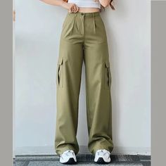 Fabricated with polyester, this garment features a secure zipper closure and a mid-rise waist. DETAILSMaterial: PolyesterClosure Type: Zipper FlyWaist Type: Mid Pants Silhouette, Tomboy Fits, Celana Kargo, Cargo Pants Streetwear, Chique Outfit, Baggy Cargo Pants, Baggy Trousers, Plain Style, Mode Casual