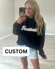 PRE-ORDER: THIS LISTING IS AN ON-GOING PRE-ORDER FOR OUR CUSTOM APPAREL. WE WILL ORDER THESE TOPS EVERY MONDAY AND THEY HAVE A 4 WEEK TURNAROUND TIME TO BE CREATED AND DELIVERED TO US. THEY WILL SHIP NEXT BUSINESS DAY ONCE WE HAVE THEM IN HAND. This is YOUR HOODIE - customize it however you want with whatever you want. Teams, schools, small shops - as long as you don't exceed 25 characters! Personalized Sweatshirt. Now you can create your own! Possibilities are endless, get creative! Select from Sporty Sweatshirt For Sports Events, Puff Print Hoodie, Mango Shop, Hoodie Customize, Sports Fonts, Puff Print, Small Shops, Retro Font, Custom Apparel