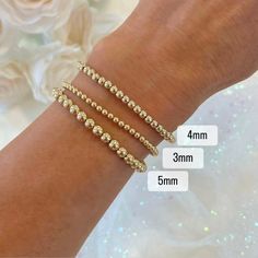 "**All bracelets are sold individually - this listing is for one (1) 14k Gold Filled Bracelet All Charleston Charmed custom name and charm bracelets come in a beautiful gift package. These also make perfect gifts for moms, grandmas, sisters, brides to be, bridesmaids, flower girls, baby shower, graduations, birthdays, bachelorette party, best friends, teachers... the list is endless. PRODUCT DETAILS ♥ These bracelets are made with sturdy quality jewelry elastic.  ♥Please select your bracelet siz Party Best Friends, Gold Bead Bracelet, Gold Beaded Bracelet, Mount Pleasant Sc, Womens Bracelet, Gold Bead Bracelets, Mount Pleasant, Gift Package, Perfect Gift For Mom