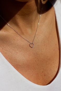 Dainty Adjustable Heart-cut Jewelry, Minimalist Adjustable Heart Necklace, Dainty Heart Charm Jewelry For Everyday, Minimalist Adjustable Heart Pendant Necklace, Delicate Sterling Silver Heart Necklace With Clavicle Chain, Minimalist Nickel-free Heart Pendant Jewelry, Dainty Hypoallergenic Heart Cut Jewelry, Dainty Heart Cut Hypoallergenic Jewelry, Minimalist Hypoallergenic Heart-shaped Jewelry