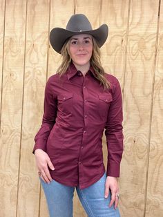 Panhandle Women's Burgundy Solid Long Sleeve Snap Up Western Shirt PSWSOSR075BUR - Painted Cowgirl Western Store Western Style Buttoned Tops For Fall, Western Style Tops With Buttons For Fall, Western Long Sleeve Workwear Tops, Western Style Long Sleeve Workwear Tops, Fitted Fall Shirt With Pockets, Western Style Tops With Button Closure For Fall, Fitted Shirt With Pockets For Fall, Red Western Style Tops For Ranch, Fitted Western Shirt For Western-themed Events