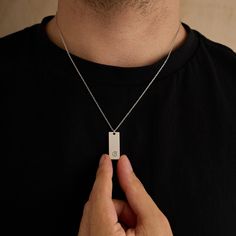 💎 This personalized bar necklace is the perfect blend of elegance and masculinity, designed to be a timeless piece for any man. Handcrafted from 925 sterling silver, this necklace is available in four striking finishes: silver, rose gold, black, and gold, offering a choice that complements any style. ♥️ With an adjustable length between 16 and 26 inches, this necklace can be customized to your preferred fit. Choose from 6 unique font styles to personalize the front with initials, names, or meaningful words. On the back, you can add a special touch by engraving coordinates, a message in your own handwriting, or a symbol like a heart or any other design that holds personal significance. 🖤 Whether you're commemorating a special place with engraved coordinates or gifting a loved one with a p Minimalist Sterling Silver Necklace For Father's Day, Minimalist Rectangular Pendant Necklace For Father's Day, Father's Day Minimalist Rectangular Pendant Necklace, Minimalist Dog Tag Necklace For Father's Day, Minimalist Rectangular Pendant Jewelry For Father's Day, Initial Tag Necklace, Unique Font, Ring Holder Necklace, Rose Noir