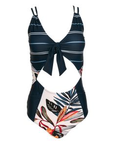 FINAL SALEStand out next time you hit the water in this bold mixed print fan favorite. The Rip Curve One Piece has adjustable straps to fit every height and wouldn't be complete without the classic Nani pockets. Funky Antigua print on bottom with Navy trim and our Kai stripe print on top. FITTrue to sizeSnug when dryHigh coverageMedium supportFEATURESBuilt-in bra with removable soft cupsFully lined buttery soft liningSide pockets in frontAdjustable double spaghetti strapsTie at bust and full cov High Tide, Stripe Print, Cream Color, One Piece Swimsuit, Spaghetti Strap, Adjustable Straps, Spaghetti, One Piece, Trim