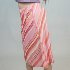 Y2k Striped Beaded skirt! Sherbet pastel colorway knee length skirt by New York & Company. Size M with stretch! Waist: 32"Hips: 40"Length: 25"