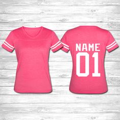 ★ BESTSELLING CUSTOM JERSEY T-SHIRT! CUSTOM NAMES! Celebration Factory celebrates precious family moments and life events.★ ★FAST SHIPPING! Great for adults, men and women sizes! 1. Select your shirt size & color 2. Add any custom name and number for your shirt 3. Make your purchase when you have added all shirts We do the rest! ★Sizing★ Men - S, M, L, XL, 2XL Women - S, M, L, XL, 2XL, Great gift for any Man or lady in the family! These t-shirts are soft and feel great with no itch! ★T I M E Pink Moisture-wicking Top For Sports Events, Sports Team Name Pink T-shirt, Pink Crew Neck T-shirt For Sports Events, Pink T-shirt With Team Name For Sports Season, Pink Crew Neck T-shirt With Team Name, Pink Short Sleeve T-shirt With Team Name, Pink Tops With Team Name For Team Spirit, Pink Team Spirit T-shirt With Short Sleeves, Pink Team Spirit Tops With Team Name