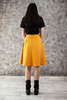 - Stylish casual skirt - Big pleats with pockets - Plain back with zipper - Soft polyviscose suiting fabric - Available in 30+ colors Please, use this size chart to select your size US 0 Bust 82 cm (32.5 inches) Waist 64 cm (25 inches) Hips 89 cm (35 inches) US 2 Bust 85 cm (33.5 inches) Waist 66 cm (26 inches) Hips 92 cm (36 inches) US 4 Bust 88 cm (34.5 inches) Waist 68 cm (27 inches) Hips 94 cm (37 inches) US 6 Bust 90 cm (35.5 inches) Waist 71 cm (28 inches) Hips 96 cm (38 inches) US 8 Bust Fitted A-line Mini Skirt With Pockets, Flared Mini Skirt With Pleated Waist For Work, Workwear Gathered Flared Skirt, Gathered Flared Skirt For Workwear, Knee-length Pleated Skirt With Pockets For Work, Midi Length Pleated Skirt With Pockets For Work, Solid Color Knee-length Skirt With Pleated Waist, Chic Knee-length Pleated Skirt With Pockets, Yellow Knee-length Pencil Skirt