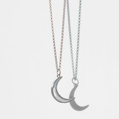 The silver moon necklace is the ultimate talisman for female empowerment and celebrates the inspirational women in our lives and throughout the world. 925 sterling silver & rhodium plate To keep your jewellery in peak condition, please polish with a micro-fibre cloth Minimalist Moon Phase Pendant Necklace, Sterling Silver Moon Phase Charm Necklaces, Everyday Half Moon Phase Necklace, Moon Charm Necklace As A Gift For Her, Elegant Silver Moon Jewelry, Elegant Silver Moon-shaped Jewelry, Minimalist Moon Phase Necklace, Celestial Crescent Charm Necklaces, Spiritual Moon Charm Necklace As A Gift For Her