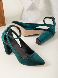 With a comfortable heel height of, these Green Velvet Shoes will keep you dancing all night long without sacrificing style or comfort. Crafted from high-quality green velvet, these emerald green bride shoes are stylish and comfortable.  These shoes are designed to fit true to size, so we recommend ordering your regular size. Velvet. To protect your shoes from dampness, apply a waterproof spray when they're new. For cleaning, use a mild soap solution and wipe the surface with a damp cloth that has been wrung out. Green Velvet Shoes, Vegan Heels, Velvet Block Heels, Stylish Heels, Velvet Shoes, Stocking Fillers For Her, Velvet Heels, Sneaker Stores, Bride Shoes