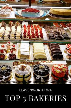 a display case filled with lots of different types of cakes