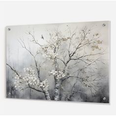 a painting with white flowers on it and a tree in the foreground, against a gray background