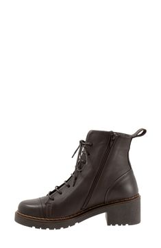 This modern boot is emboldened with a combat-style silhouette, adjustable laces, a side-zip closure and a rugged rubber sole for a commanding look. 2" heel; 3/4" platform 5 1/4" shaft Lace-up style; side zip closure Cushioned footbed with arch support Leather upper and lining/rubber sole Made in Turkey Leather Footbed Ankle Combat Boots, Leather Ankle Moto Boots With Lace-up Fastening, Outdoor Leather Lace-up Boots, Leather Combat Boots With Front Lace-up, Leather Sole Ankle Hiking Boots, Leather Ankle Boots With Lace-up Fastening, Ankle Hiking Boots With Lug Sole, Leather Ankle Boots With Lacing, Leather High Ankle Moto Boots With Front Lace-up