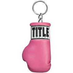 a pink boxing glove shaped keychain with the word'little'on it