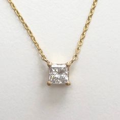 Stunning solitaire Princess cut necklace, mounted in 14K yellow gold Please choose your favorite gold color :) Setting -Total Carat Weight: 0.60 -14K Yellow Gold -Gold Weight (gr.): 2 -Size: Resizeable -Certificate Of Authenticity Included by www.gil-lab.com Main Diamonds: -Princess cut -0.60 Carat -Color: F -Clarity: SI1 -Clarity Enhanced About us: Israel has always been one of the greatest diamond industries in the world. Our office has been a pioneer in the field of treated diamonds ever sinc Princess Cut Necklace, Solitaire Princess Cut, Princess Cut Solitaire, Oval Diamond Engagement, Natural Diamond Ring, Yellow Gold Engagement, Princess Diamond, Solitaire Pendant, Yellow Gold Pendants