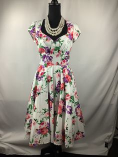 "This is a 1950s Aline dress in a gorgeous print. Pit to pit 17\", waist 28\", length from waist 26.5\"." 1950s Style Fit And Flare A-line Vintage Dress, Retro A-line Vintage Dress For Garden Party, Retro A-line Midi Dress For Garden Party, Floral Print Fitted Bodice A-line Midi Dress, Floral Print A-line Midi Dress With Fitted Bodice, Fitted Bodice A-line Midi Dress With Floral Print, 1950s Style A-line Dress With Box Pleat, Vintage A-line Midi Dress For Garden Party, Retro A-line Dress With Vintage Print