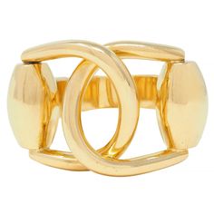 Designed as two large horsebit motifs interlocking Stylized and sleek with high polish finish Stamped with Italian assay marks for 18 karat gold Fully signed for Gucci, Made in Italy Circa: 2004; from the Horsebit Collection Ring size: 4 1/2 and sizable Measures north to south 18.0 mm and sits 6.5 mm high Total weight: 18.1 grams Stock Number: We-12846 Designer Gucci Rings With Polished Finish, Gucci Rings With Polished Finish For Formal Occasions, Gucci Yellow Gold Rings For Formal Occasions, Modern Gucci Yellow Gold Jewelry, Gucci Luxury Rings For Formal Occasions, Luxury Gucci Rings For Formal Occasions, Gucci Luxury Formal Rings, Gucci Designer Rings In 14k Gold, Gucci 14k Gold Designer Rings