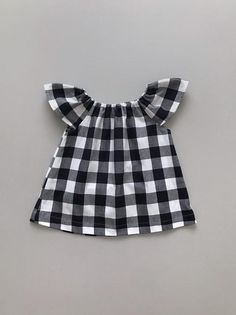 fall gingham flutter top / peasant top / buffalo check top / boho top / toddler fall top / girls swi Cute Plaid Short Sleeve Tops, Cute Short Sleeve Plaid Tops, Short Sleeve Ruffled Tops For Picnic, Ruffled Short Sleeve Tops For Picnic, Cute Gingham Cotton Blouse, Cute Gingham Blouse For Summer, Cute Cotton Gingham Blouse, Cute Plaid Tops For Fall, Cute Ruffled Tops For Picnic