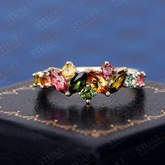 K Solid Gold Ring Kite Shape Natural Tourmaline For Women Wedding Engagement Band Rainbow Gemstone Handmade Cluster Ring ----The Ring Details---- * Gem Stone: Natural Tourmaline * Gem Stone Size: Marquise Cut 2.5*5mm*4pcs  Round Cut 2.5mm*7pcs * Gemstone Total Weight:  Approx 1.08 ct * Material: 10K/14K/18K Solid Gold * Band Width: 1.6 mm * Want to know more details? Please contact me. ----Others Information---- ✦ Guaranteed Purchase: - 14 Day Refund Guarantee; - Excellent Customer Service; - Free Transportation and insurance to All Parts Of The World; - Free Gift Box&Packing ✦It is my honor to design ring for you :) I accept custom making service.Please contact me if you need it.  ✦Please allow 2-3 weeks for manufacturing. Because our rings are all handmade! Need it sooner? Just ask and w Multi Color Stone Ring, Multicolor Gemstone Ring For Wedding, Anniversary Sapphire Ring With Tourmaline Gemstone Accents, Anniversary Sapphire Ring With Tourmaline Accents, Wedding Tourmaline Gemstones, Multi-stone Tourmaline Gemstones For Anniversary, Elegant Tourmaline Sapphire Ring For Wedding, Elegant Tourmaline Sapphire Wedding Ring, Multicolor Cluster Wedding Ring