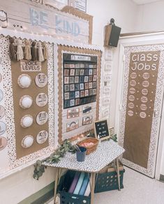 a bulletin board in the corner of a room with writing on it and other decorations