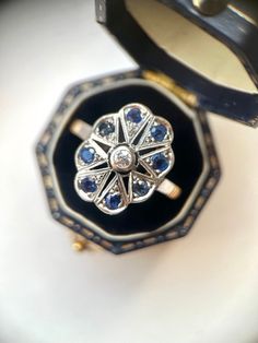 1930s Antique Art Deco Navette Ring with Diamond & Sapphires This elegant ring is an original Art Deco piece dating back to 1930s. It will make a lovely engagement ring or simply a one-of-a-kind addition to your collection! ABOUT THE RING: -Band: 18K Solid Yellow Gold -Setting: 18K Solid White Gold -Setting Measurements: 1.7 x 1.3 x 0.4 Cm Approx -4.1gr -Diamond: Natural, Old Cut Diamond (0.10 ct) -Color/Clarity: H-I-J VS-SI 1-2 -Gemstones: Sapphires (0.40ct) -Diameter: 19.5 Mm Size: US 9 1/2. C Art Deco Multi-stone Platinum Diamond Ring, Art Deco Multi-stone Oval Sapphire Ring, Art Deco Oval Multi-stone Sapphire Ring, Art Deco Multi-stone Oval Jewelry, Antique Platinum Ring With Gemstone, Antique Platinum Gemstone Rings, Antique Platinum Rings With Gemstone, Art Deco Oval Ring With Center Stone, Heirloom White Gold Sapphire Ring With Multi-stone