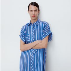 Zara Striped Shirt Dress With Front Pocket And Button Up Closure. Size Xs-S, Only Two Sizes Made In This Edition. Armpit To Armpit 24”, Length 49”, 63% Cotton, 37% Polyester Blue Button-up Shirt Dress For Vacation, Striped Relaxed Fit Shirt Dress For Summer, Casual Oversized Striped Dresses, Blue Cotton Shirt Dress For Summer, Oversized Blue Casual Dress, Casual Oversized Blue Dress, Oversized Striped Summer Dresses, Striped Short Sleeve Cotton Shirt Dress, Striped Cotton Short Sleeve Shirt Dress