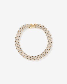 Elevate your jewellery collection with this luxurious 10 karat yellow gold cuban link curb chain bracelet. Featuring 2.00 carat total weight of pave-set, round brilliant diamonds with HI colour and I2 clarity. At 21cm, and 9-9.5mm in width, it secures with a lobster clasp. Cuban Link Bracelet, Curb Chain Bracelet, Wedding Day Jewelry, Engagement Ring Guide, Diamond Bridal Sets, Diamond Shop, Earring Sale, Diamond Set, Gold Collection