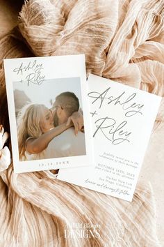 an image of a couple kissing on their wedding day with the save the date cards