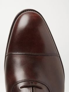 Brown Leather Oxford Shoes, Double-stitched Cap Toe, Leather Linings And Soles, Handmade In Northampton, England, Comes With A Dust Bag, Available In Other Colours The clean, simple design and luxurious comfort of these John Lobb Oxford shoes belie the complex processes that go into making them: with over 190 steps, many of them completed by hand, each pair is a unique example of superior British craftsmanship. The slightly burnished-leather is selected for its smooth appearance and soft feel, … Northampton England, Oxford Shoes For Men, Brown City, Oxford Shoes Brown, Suede Oxfords, Brown Oxfords, John Lobb, Oxford Shoes Men, Leather Oxford Shoes