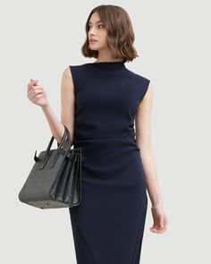 The elevated midi dress is a wardrobe must-have — Manon exudes effortless polish with its asymmetric neckline, ruched sides, and wrap front. We love to style it with a sleek pair of heeled boots for a desk-to-drinks look. See below for our general Size Guide and available measurements Made of 73% rayon, 23% nylon, and 4% spandex Machine wash cold and lay flat to dry Asymmetric Neckline, Ruched Dress, Lay Flat, Heeled Boots, Size Guide, Must Haves, Night Out, Midi Dress, Sleek