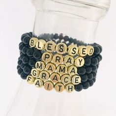 This stretch bracelet is made with 6mm black onyx beads and 7mm gold with black letter acrylic beads. You choose any motivational word or name. The possibilities are endless!! It is strung on high quality stretch cord and will be made in an average 7 inch size that will fit most wrists. If unsure about size, measure your wrist and add 1/2 inch to the measurement to determine the size you need. If a different size other than 7 inches is needed, please leave a note in the comments section at check Black Beaded Bracelets With Letter Print As Gift, Black Round Bead Jewelry With Letter Details, Black Beaded Bracelet With Letter Print As Gift, Black Name Bracelet With Round Beads, Personalized Black Spiritual Jewelry, Black Personalized Name Bracelet With Round Beads, Black Spiritual Jewelry With Letter Beads, Personalized Black Name Bracelet With Round Beads, Personalized Black Bracelets With Round Beads