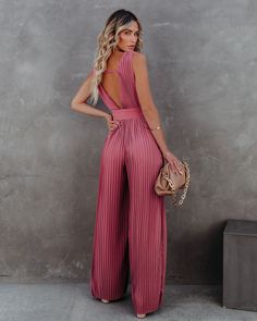 Best Seller True to Size Self & Lining100% Polyester Machine Wash Cold. Line Dry Draped Neckline Structured WaistbandNon-Elastic Wide Pant Leg Removable/ Adjustable Waist Belt Pleated Fabrication Concealed Back Zipper Closure Fully Lined //Best Seller// New Color// Be the best guest dressed at any event in our High Tea Pleated Wide Leg Belted Jumpsuit! This dark rose pleated jumpsuit has a wide leg and a draped neckline. The structured waist features an adjustable belt. Styled with the Tina Twisted Hoops. Chloe Mini Necklace. The Buddha Wheel Necklace. Simple Bangle Bracelet. Chic Crossbody Chain Pouch Bag. and Formal Faux Suede Heel.---SIZE AND FIT---Model is Wearing a Size Small. Height is 5'7". Bust is 32 Waist 25 and Hips 30/span> Size S: Length measures 59.5from shoulder to hem with a Elegant Pink Stretch Jumpsuits And Rompers, Elegant Pink Jumpsuits And Rompers For Beach, Elegant Pink Beach Jumpsuits And Rompers, Elegant Pink Jumpsuit For The Beach, Bell Jeans, Pleated Jumpsuit, Belted Jumpsuit, Belt Jumpsuit, Draped Neckline