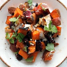 a white plate topped with lots of food